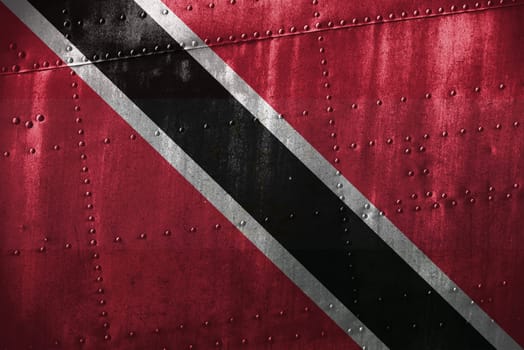 metal texutre or background with trinidad and tobago flag