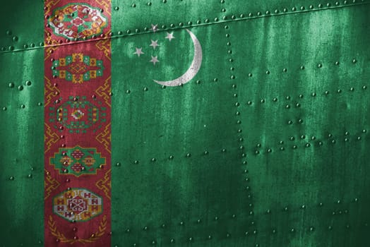 metal texutre or background with turkmenistan flag