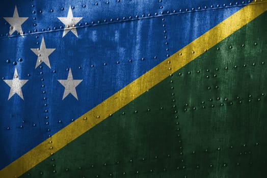 metal texutre or background with solomon islands flag