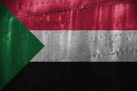 metal texutre or background with sudan flag