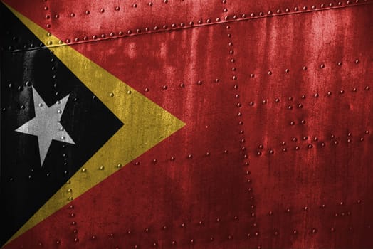 metal texutre or background with timor-leste flag
