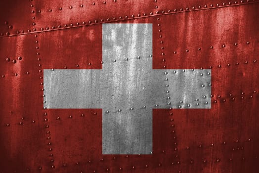 metal texutre or background with switzerland flag