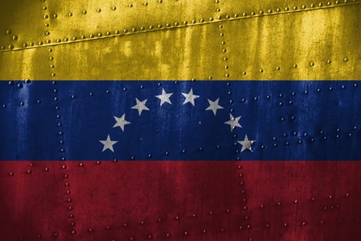 metal texutre or background with venezuela flag