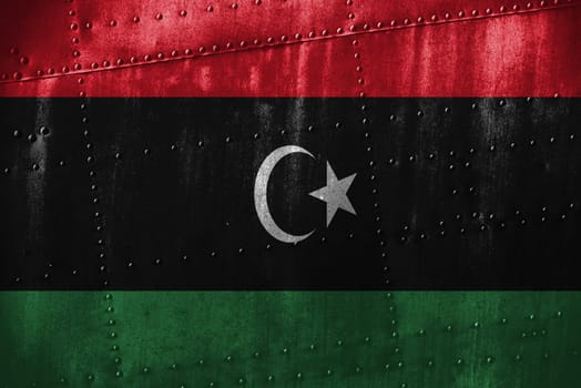 metal texutre or background with libya flag
