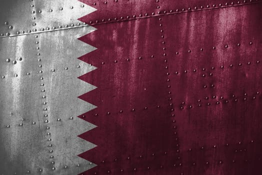 metal texutre or background with qatar flag