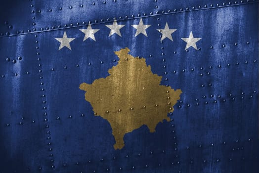 metal texutre or background with kosovo flag