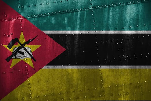 metal texutre or background with mozambique flag
