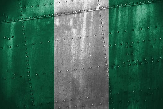 metal texutre or background with nigeria flag
