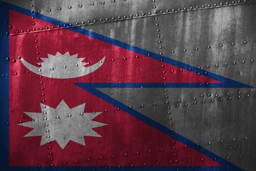 metal texutre or background with nepal flag