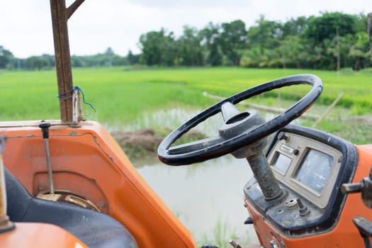 Tractor in a rice field