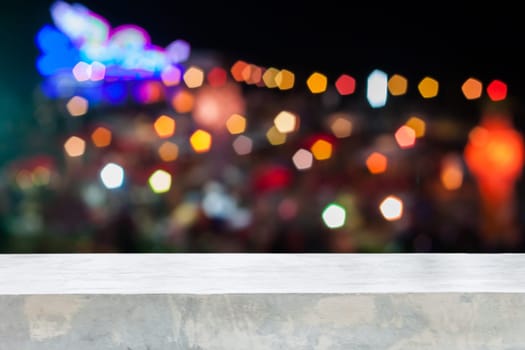 Concrete table top with abstract blurred lights, stock photo