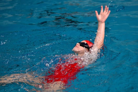 swimming girl competing