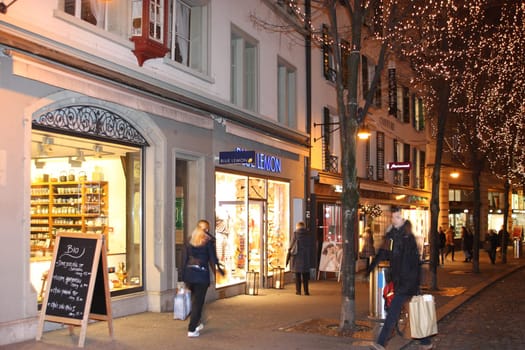 Lucerne, Switzerland - Novembre 24 2016. Evening view of the shopping street before Christmas.