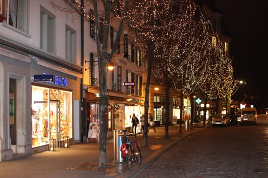 Lucerne, Switzerland - Novembre 24 2016. Evening view of the shopping street before Christmas.