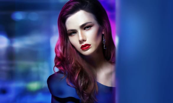 Portrait of a woman on a background of blue cityscape.