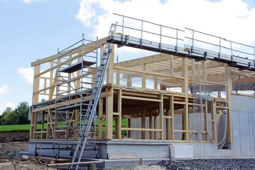 The new construction of a wooden house. Shell of a wooden house