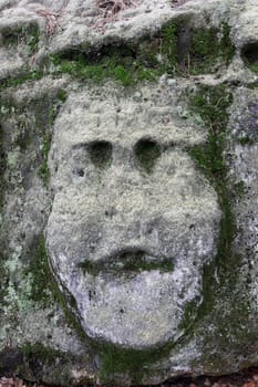 Scary Stone Heads - rock sculptures of giant heads carved into the sandstone cliffs in the pine forest above the village Zelizy in the district Melnik, Czech republic. It is the works of sculptor Vaclav Levy, who created in the period 1841-1846.
