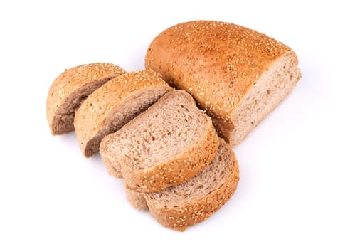Sliced loaf of bread with sesame seeds on white background.