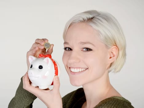 Woman with piggy bank