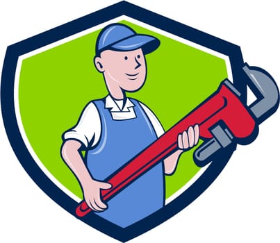 Illustration of a mechanic cradling holding giant pipe wrench looking to the side viewed from front set inside shield crest on isolated background done in cartoon style.