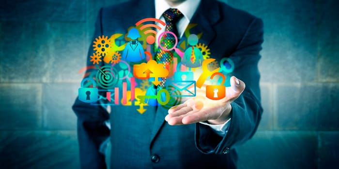 Man offering a cloud infrastructure solution made of a host of colorful managed services icons. Information technology concept for desktop virtualization, digital transition and MSP as facilitator.