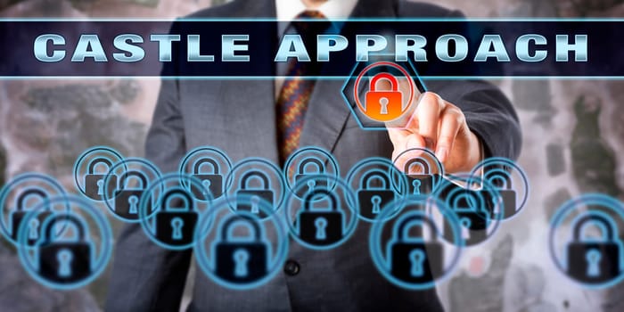 Security professional is touching CASTLE APPROACH on an interactive control screen. Computer network security, information assurance and data protection concept for defense in depth.