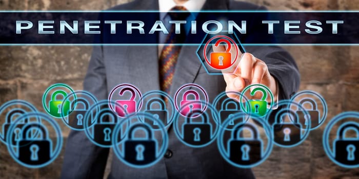 Corporate software tester pushing PENETRATION TEST on an interactive screen. Information security concept for the process of trouble shooting for potential vulnerabilities, risks and cyber attacks.