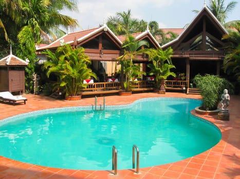 Siem Reap, Cambodia - February 16, 2011: A hotel Angkoriana in khmer style in Siemreap, Cambodia. Siem Reap is the capital city of Siem Reap Province and a popular resort town as the gateway to Angkor region
