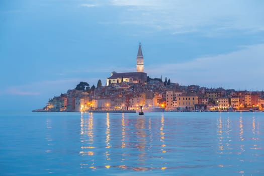 Coastal town of Rovinj, Istria, Croatia in sunset. Romantic Rovinj is a town in Croatia situated on the north Adriatic Sea Located on the western coast of the Istrian peninsula.