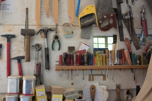 Shelves with tools in carpenters workshop