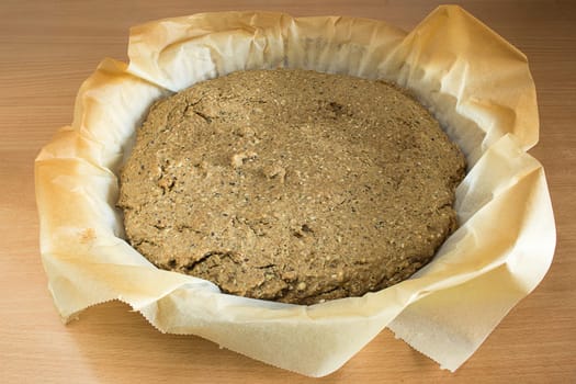Just baked, fresh, domestic unleavened barley bread on the kitchen table