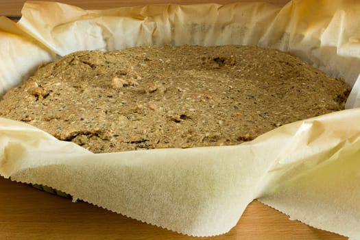 Just baked, fresh, domestic unleavened barley bread on the kitchen table