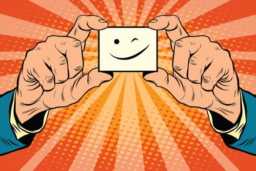 wink Smiley face in hands, pop art retro vector illustration