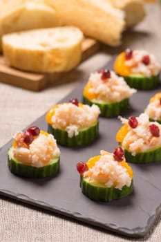 Crab meat appetizer served on Cucumber slices
