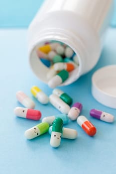 Colorful pill with froehlichen faces,mental health concept