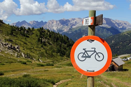 Traffic sign - cycling ban in the mountains. Cycling in the mountains prohibited