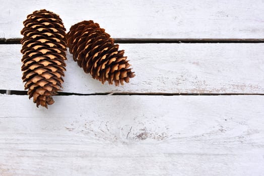 Christmas stars natural decoration on white wood background