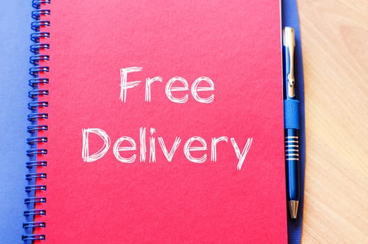 Free delivery text concept write on notebook