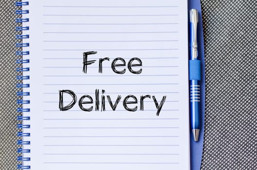 Free delivery text concept write on notebook