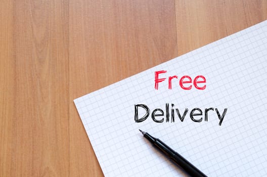 Free delivery text concept write on notebook