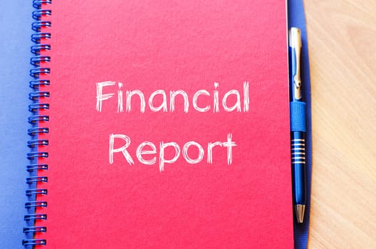 Financial report text concept write on notebook