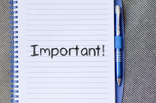 Important text concept write on notebook