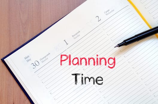 Planning time text concept write on notebook