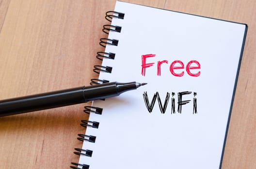 Free wifi text concept write on notebook