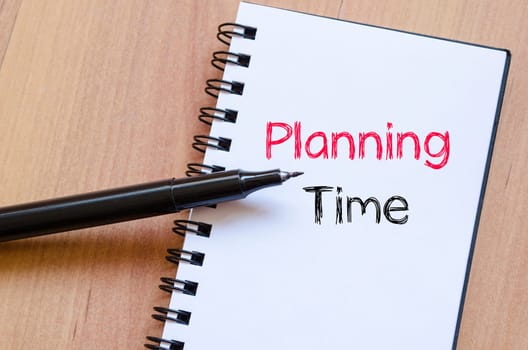 Planning time text concept write on notebook