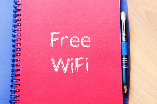 Free wifi text concept write on notebook