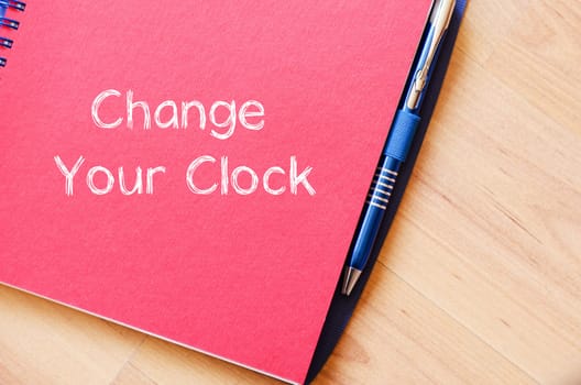 Change your clock text concept write on notebook