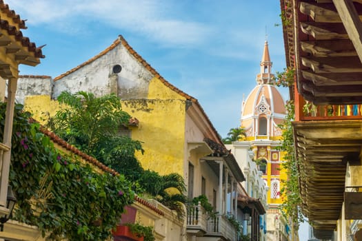 Old balconies and the colorful cathedral in Cartagena, Colombia