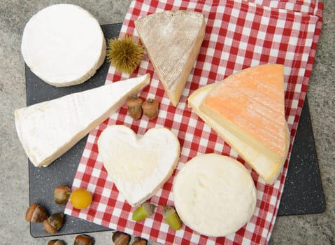 the different french cheese on a slate