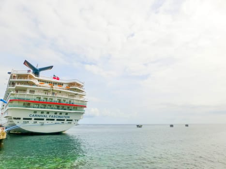 Saint Kitts, Federation of Saint Kitts and Nevis - May 13, 2016: The Carnival Cruise Ship Fascination at dock. She is one of 8 sister ships and received a million dollar refurbishment in 2006